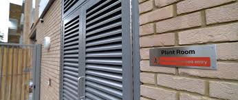 INDUSTRIAL STEEL LOUVERED PLANT ROOM DOORS FABRICATED TO LPS1175 SR2 AND PAS24 STANDARD. PRODUCED AND INSTALLED BY PREMIER SECURITY CONSULTANTS LTD.