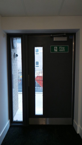 INDUSTRIAL FIRE EXIT STEEL DOORS FABRICATED TO LPS1175 SR2 AND PAS24 STANDARD. PRODUCED AND INSTALLED BY PREMIER SECURITY CONSULTANTS LTD.