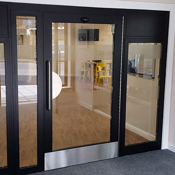 INTEGRAL LPS1175 SR2 60-MINUTE FIRE-RATED DOOR AND SIDE PANELS. SECURED BY DESIGN