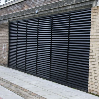 LOUVERED DOOR FABRICATED IN STEEL TO PAS24 STANDARD. SECURED BY DESIGN PASSED. INSTALLED IN ESSEX. LPS1175 SR2